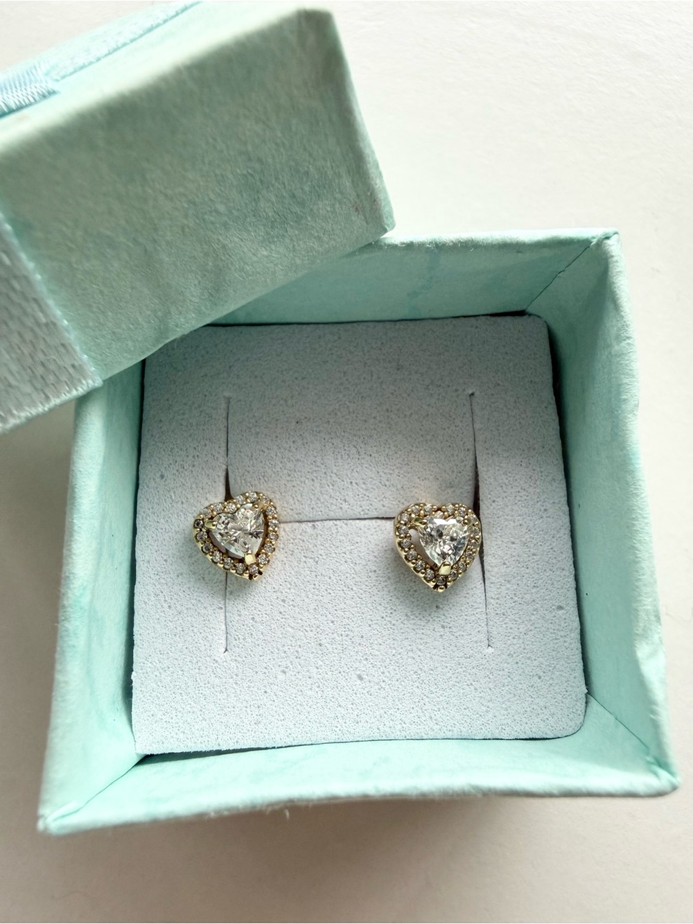 Authentic Pandora Elevated Heart Stud Earrings 14k gold plated.